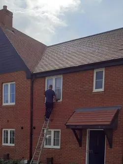 Our cleaning team working on windows
